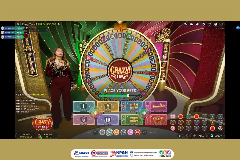 crazy time a, pachinko, crazy time a game interface, color wheel, number wheel, symbol wheel, casino wheel game, evolution, evolution live, female host, wheel of fortune, spin the wheel, red and green background, pagcor, www.pagcor.ph/regulatory, npgh, national problem gambling helpline, npgh: (02) 8248-9568, ResponsibleGaming@pagcor.ph, 789bingo