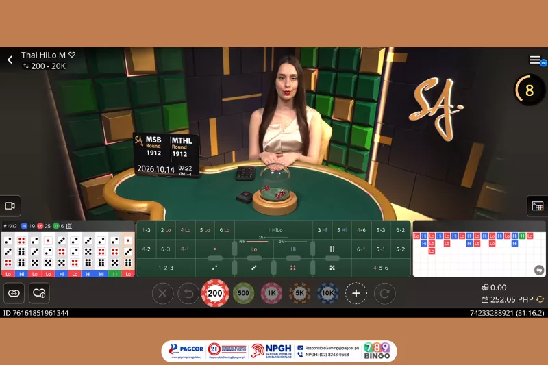m thai hilo, thai hilo, hilo, m thai hilo game interface, sa gaming, sa gaming logo, female host, Thai HiLo table, dice, casino dice game, hi, lo, 3d cube wall decoration, black-yellow-darkgreen-lightgreen background, pagcor, www.pagcor.ph/regulatory, npgh, national problem gambling helpline, npgh: (02) 8248-9568, ResponsibleGaming@pagcor.ph, 789bingo